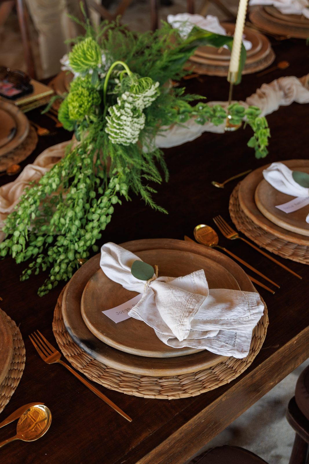 Overhead view of table with trailing floral centerpiece